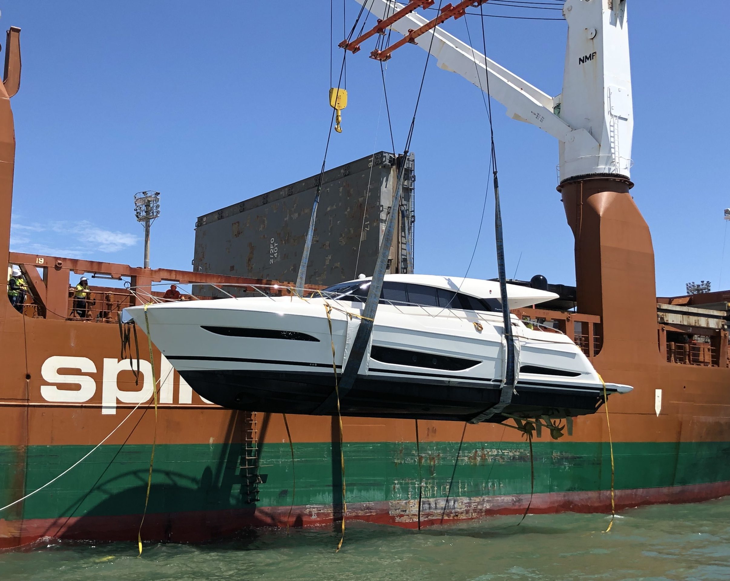 Maritimo X60 X-Series being offloaded from shipping boat to the water via hoist