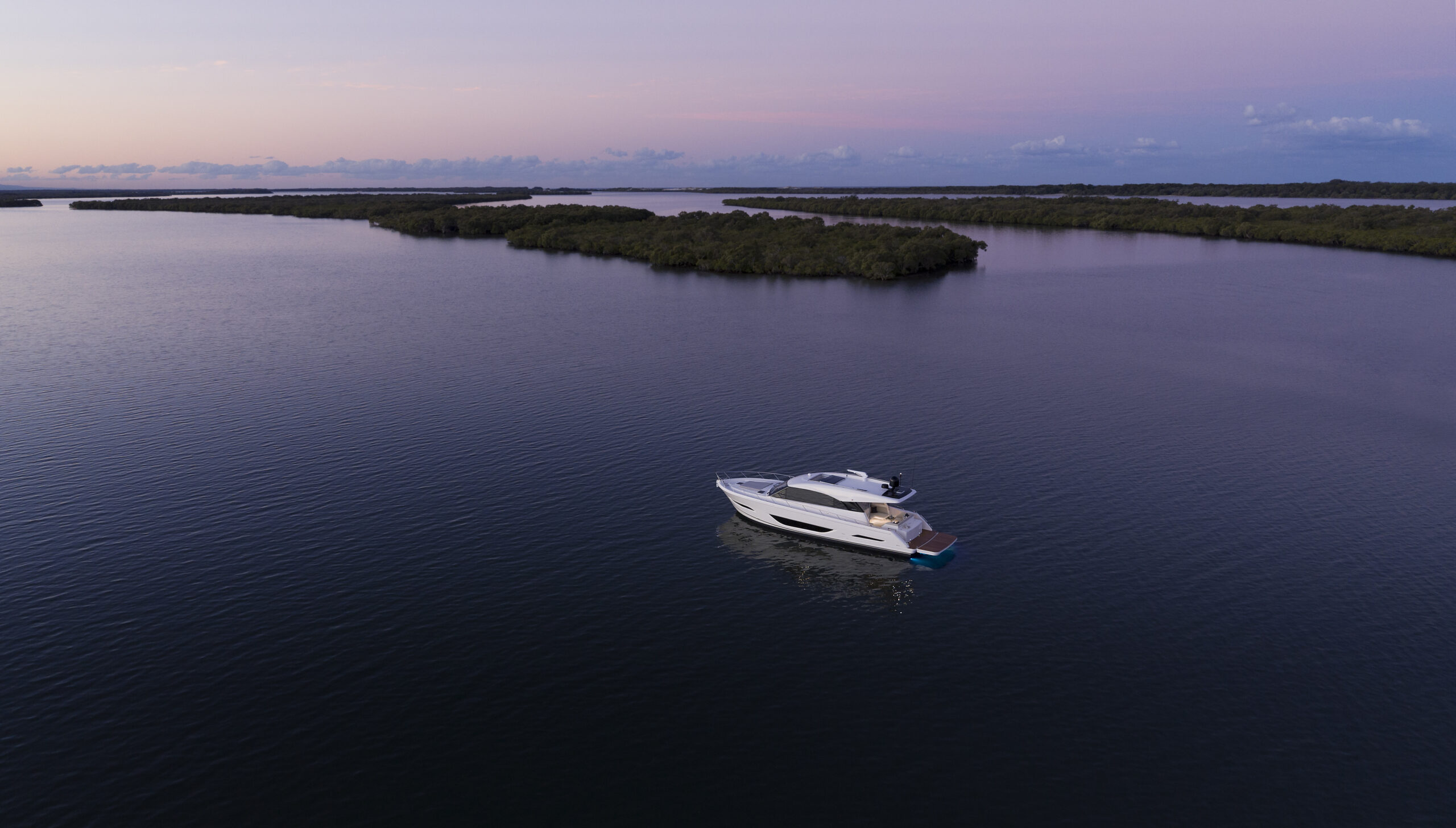 Maritimo S55 wide angle with sunset and islands in background