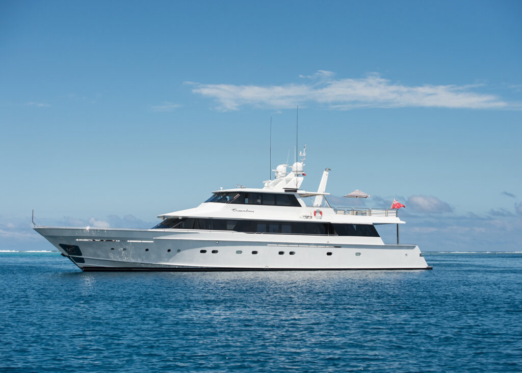 Dreamtime charter yacht pictured anchored from the side