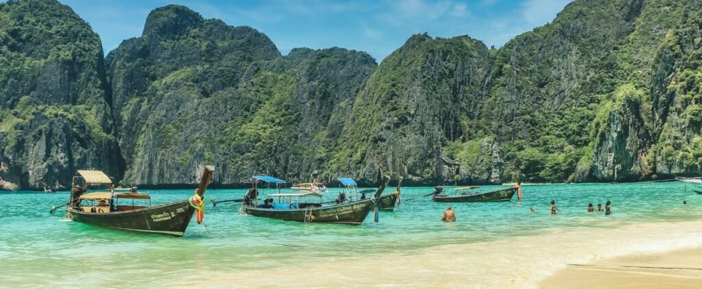 traditional boats on the shores of Koh Phi Phi
