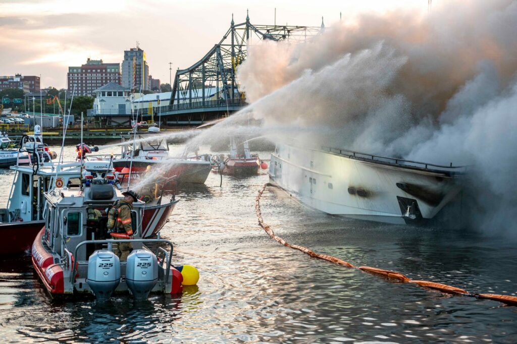 Yacht fire at New Bedford being extinguished