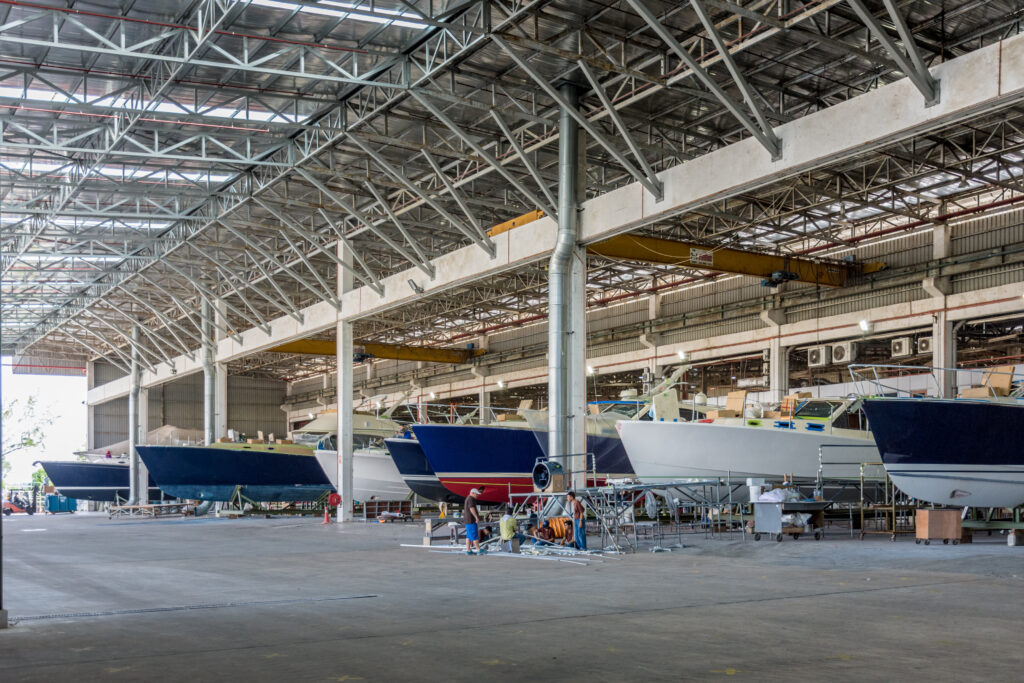 Boats lined up inside the Grand Banks factory