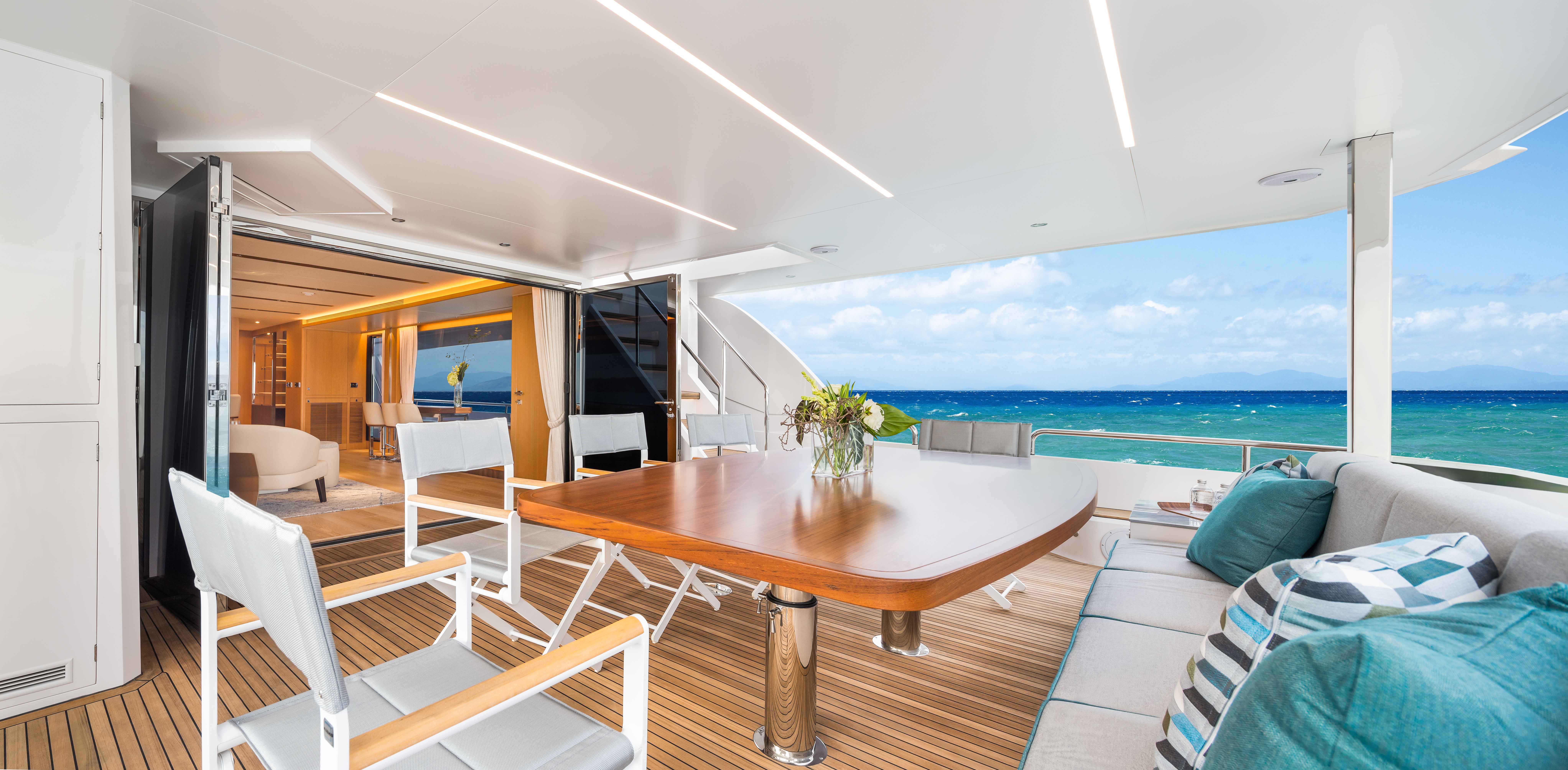 Outdoor dining area onboard the Horizon FD80