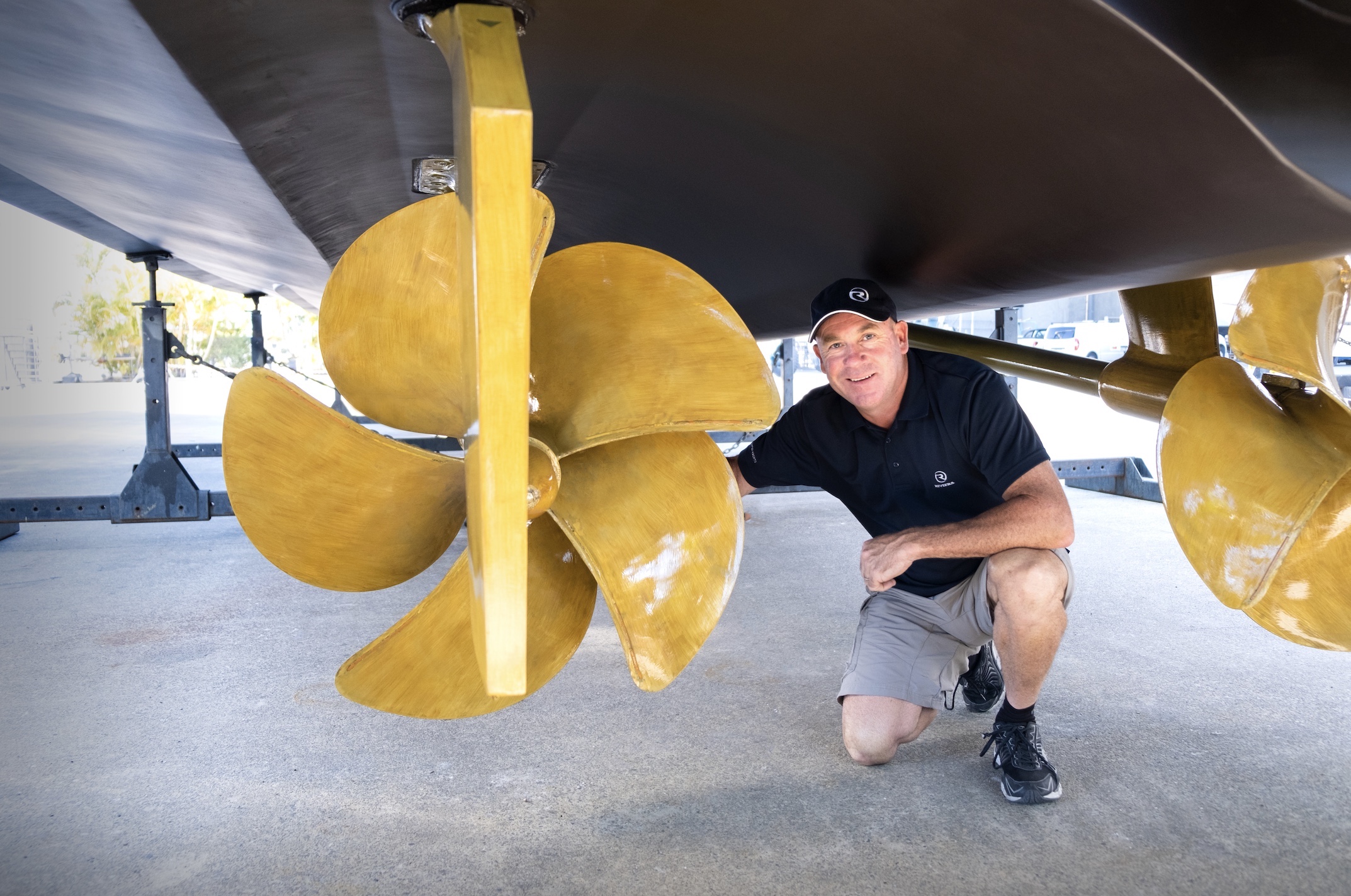 man posing with propseed on a boat