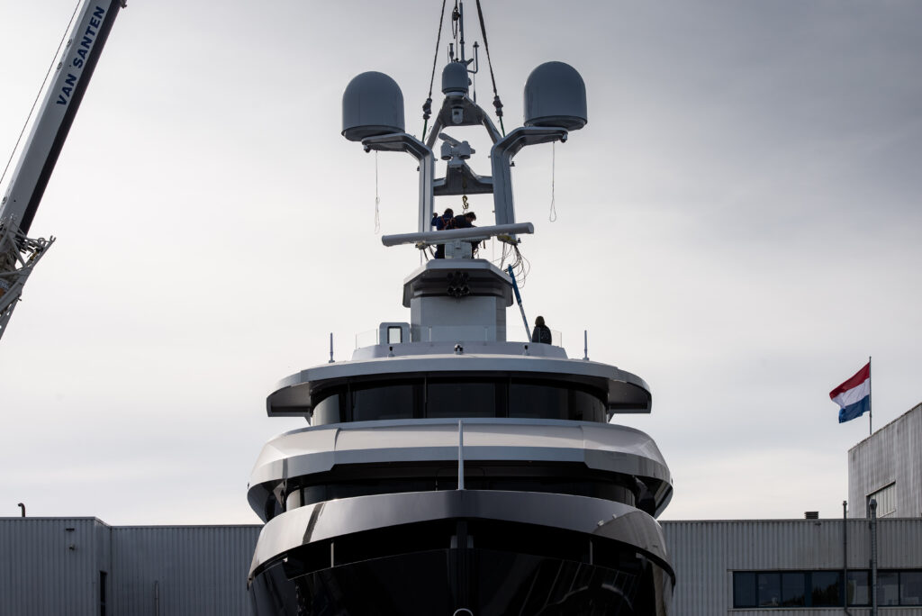 Shinkai from Vitruvius Yachts on crane being lowered front angle