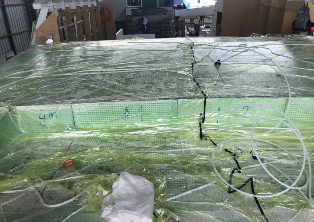 Vacuum bagging as part of the construction process for the Longreach 58