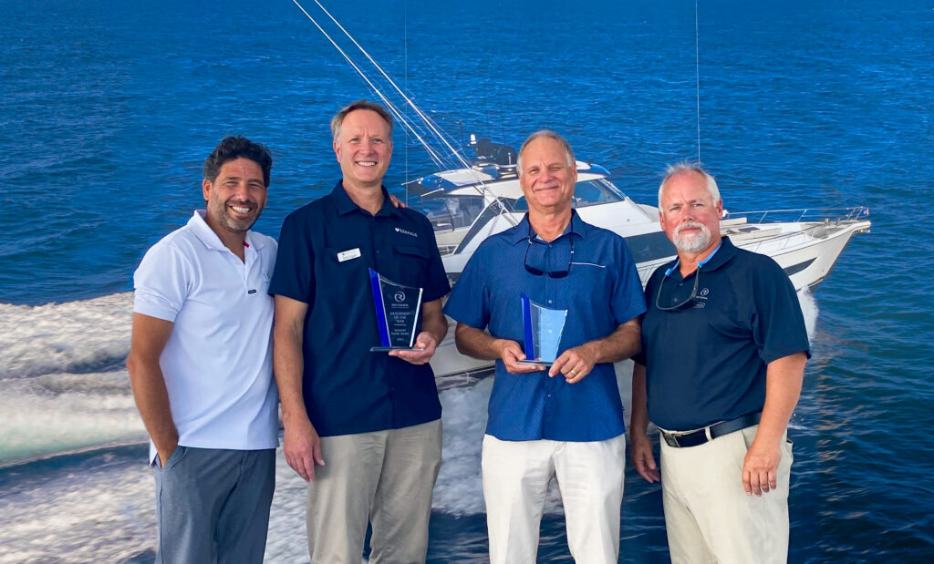 Emerald Pacific Yachts receiving award from Riviera