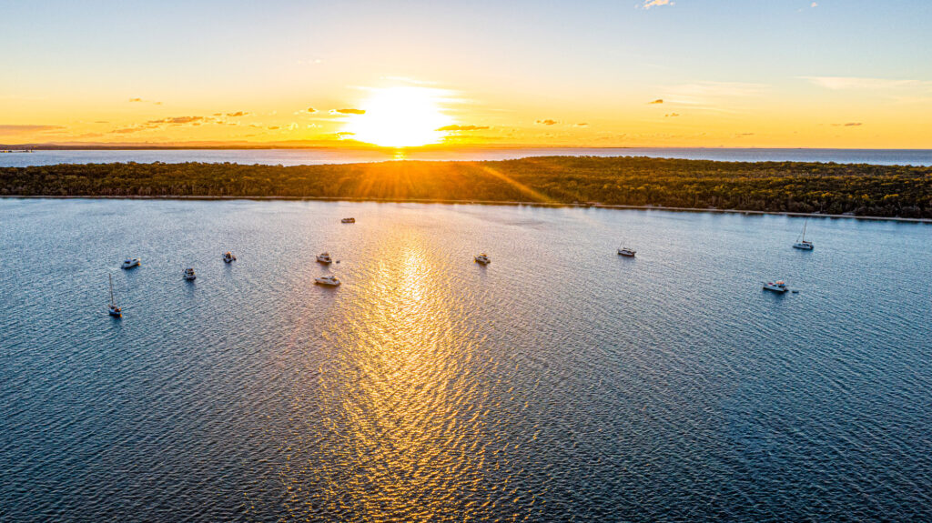 Sunset over Moreton Bay with Riviera boats