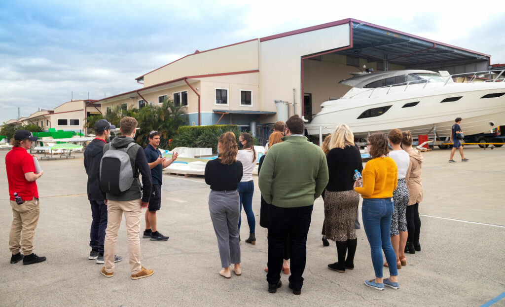Riviera Kickstarter participants on a group tour of Riviera facility outdoors