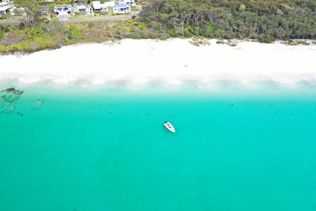 Aerial shot of the Axopar 22 at beach in Jervis Bay
