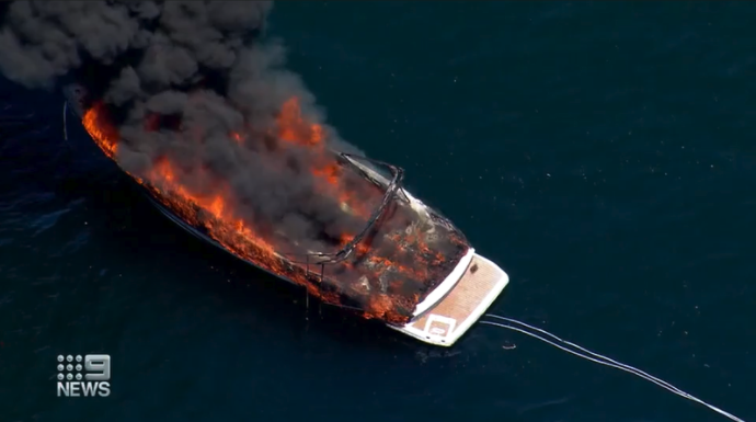 Yowie Bay boat on fire close up aerial