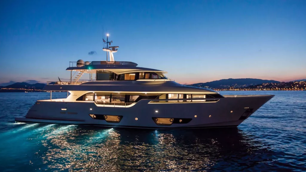 Navetta 28 Chelonia side profile anchored at night