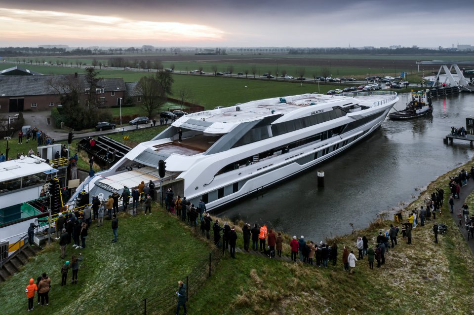superyacht Galatia from Heesen squeezing through canal locks from rear