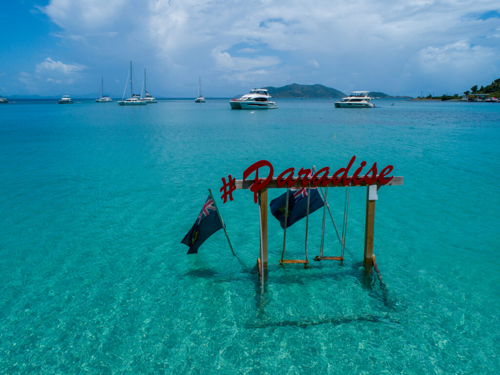 Paradise sign in the ocean