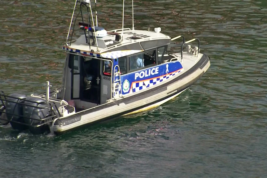 Police rescue vessel searching on Sydney Harbour